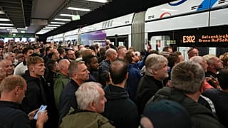 Football fans gather on train station ahead the Group C match between Serbia and England at the Euro 2024 soccer tournament in Gelsenkirchen, Germany