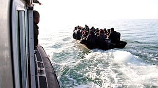 Migrants are stopped by Tunisian Maritime National Guard at sea during an attempt to get to Italy, near the coast of Sfax, Tunisia, on April 18 2023