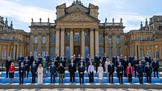 Britain's Prime Minister Keir Starmer, front center, poses for a family photo with Europe's leaders during the European Political Community Summit at Blenheim Palace.