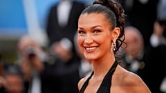 Bella Hadid poses for photographers at the premiere of the film 'Beating Hearts' at the 77th Cannes international film festival. 