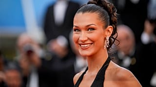 Bella Hadid poses for photographers at the premiere of the film 'Beating Hearts' at the 77th Cannes international film festival.