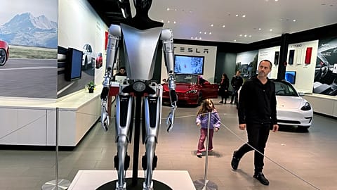 A non-working marketing model of Tesla Inc.'s proposed Optimus humanoid robot, aka Tesla Bot, is on display at the Westfield Garden State Plaza in Paramus, New Jersey