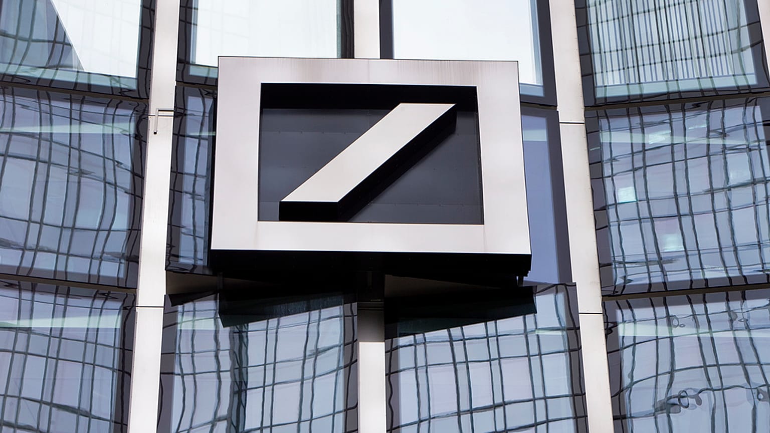 The Deutsche Bank logo is displayed at a bank's building in Frankfurt, Germany, April 9, 2018.