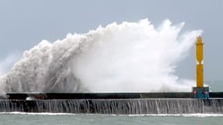 Waves crash onto the coastline before typhoon Gaemi makes landfall in northeastern Taiwan's Yilan county on Wednesday, July 24, 2024.