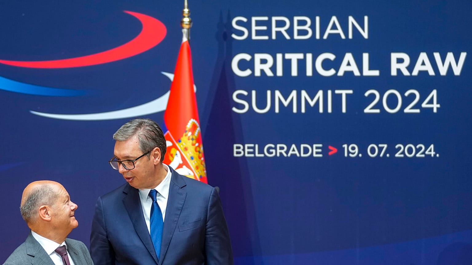 German Chancellor Olaf Scholz, left, and Serbian President Aleksandar Vucic leave after a press conference at the Serbia Palace in Belgrade, Serbia, Friday, July 19, 2024.