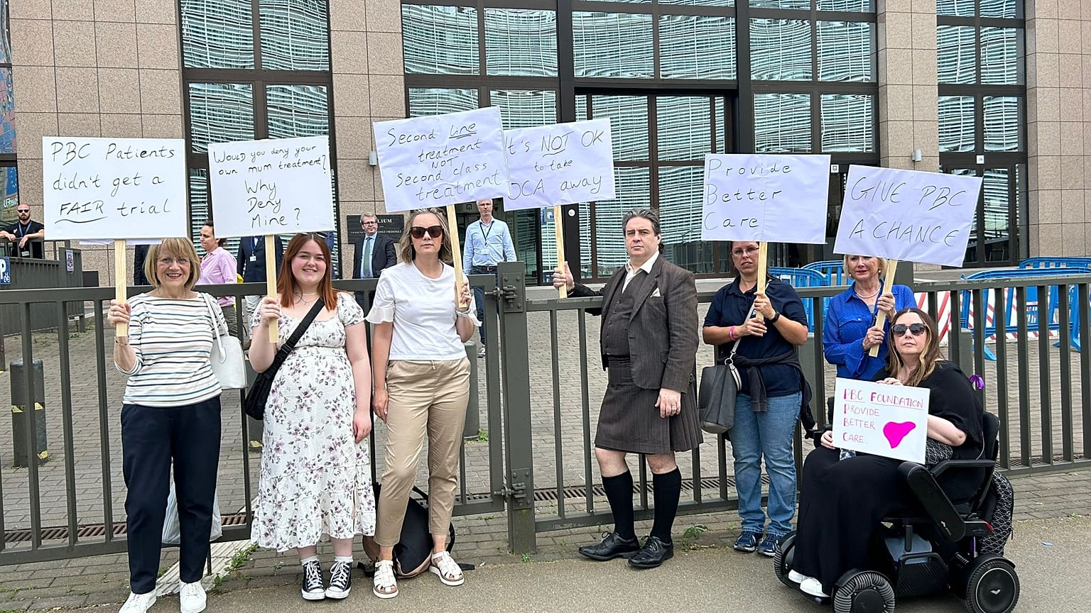 Some of the patients protesting against Ocaliva's ban posing in front of the EU Council.