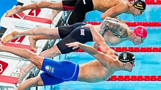 Adam Peaty, of Britain, competes during a heat in the men's 100-meter breaststroke at the 2024 Summer Olympics, Saturday, July 27, 2024, in Nanterre, France
