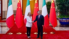 Italy's Prime Minister Giorgia Meloni shakes hands with Chinese Premier Li Qiang in Beijing, 28 July 2024