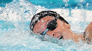 Summer McIntosh, of Canada, competes during a heat in the women's 400-meter freestyle at the 2024 Summer Olympics, Saturday, July 27, 2024, in Nanterre, France