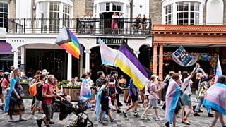 People take part in a Trans Pride protest march in Brighton, England, Saturday July 20, 2024.