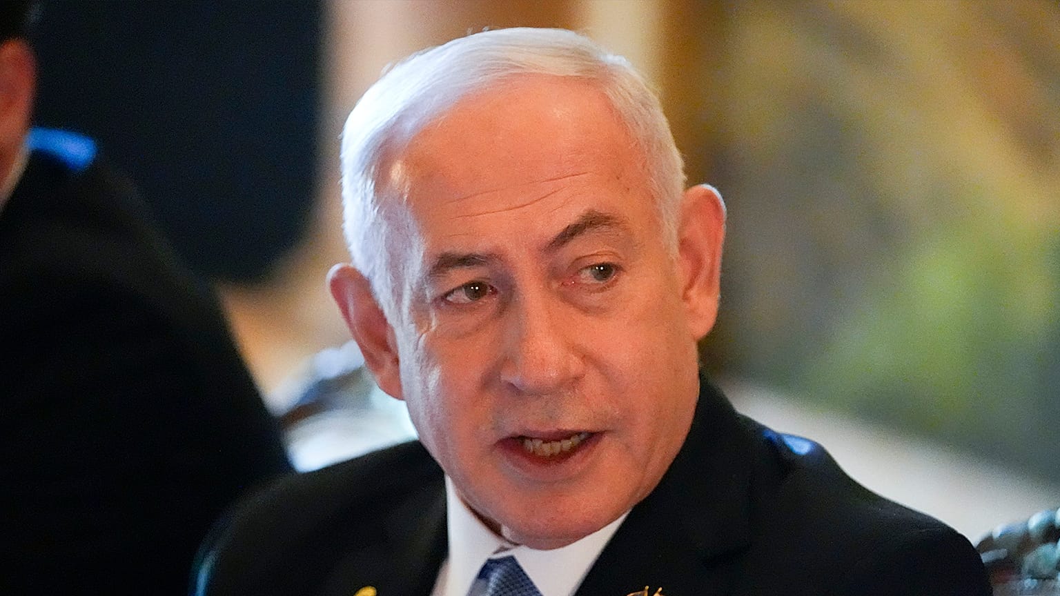 Israeli Prime Minister Benjamin Netanyahu speaks while meeting with Republican presidential candidate former President Donald Trump at his Mar-a-Lago estate, 26 July 2024