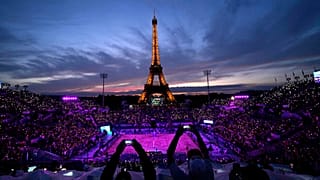 The Eiffel Tower takes centre stage at a beach volleyball match at the 2024 Summer Olympics, Saturday, July 27, 2024, in Paris, France.