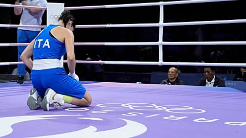 Italy's Angela Carini reacts after being defeated by Algeria's Imane Khelif, in their women's 66kg preliminary boxing match at the 2024 Summer Olympics, 1 August 2024