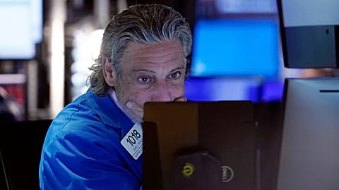Trader John Romolo works on the floor of the New York Stock Exchange on Friday, 2 August 2024