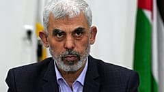 FILE - Yahya Sinwar chairs a meeting with leaders of Palestinian factions at his office in Gaza City, April 13, 2022.
