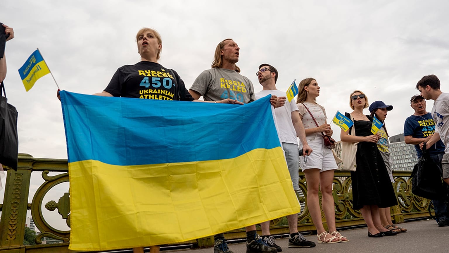 People attend a flash mob to highlight the plight of hundreds of Ukrainian athletes and coaches, both amateur and professional, who were killed as a result of Russia's war in 