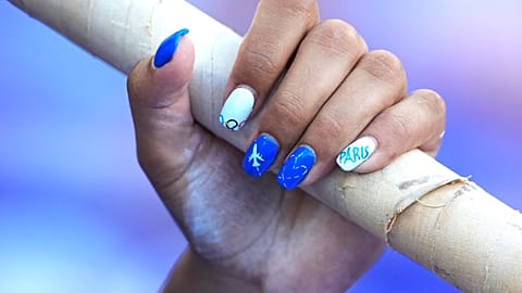 Eleni-Klaoudia Polak, of Greece, prepares for the women's pole vault qualification at the 2024 Summer Olympics.