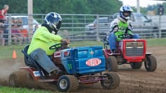 In this July 6, 2013 photo, the Southeast Missouri Lawnmower Racing Association races in Patton, Mo. 