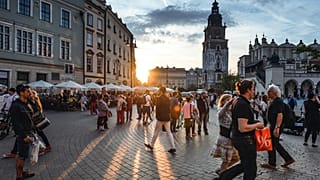 Tourists in Main Market Square Kraków, Poland