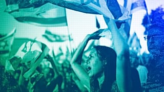 People wave Israeli flags during a protest against Israeli PM Benjamin Netanyahu's government and demanding elections outside of the Knesset, in Jerusalem, June 2024