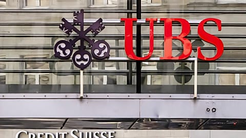 Logos of the Swiss banks Credit Suisse and UBS are seen on two buildings in Zurich
