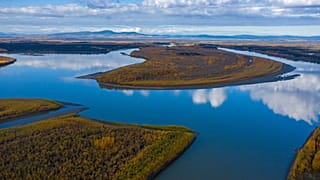 The Yukon River stretches past Stevens Village, Alaska.