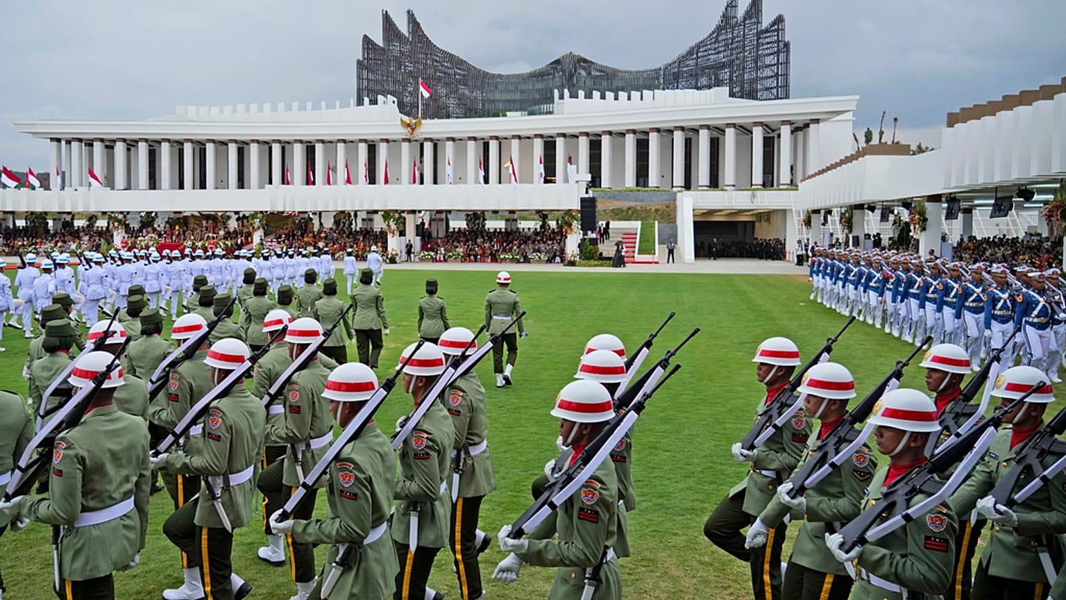  Soldiers march before the start of a ceremony marking Indonesia's 79th anniversary of the independence at the new presidential palace in its future capital city of Nusantara.