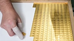 Investment gold bars being arranged for storage at the Mint of Poland, in Warsaw, Poland