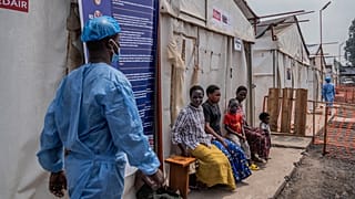 Children suffering from mpox wait for a treatment at a clinic in Munigi, eastern Congo.