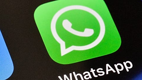A WhatsApp icon is displayed on an iPhone in Germany, November 15, 2018