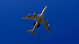 A NATO AWACS plane takes off the NATO Airbase in Geilenkirchen, Germany, Wednesday, March 12, 2014