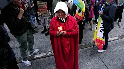 People protest Poland's restrictive abortion law in Warsaw, Poland, on Wednesday June 14, 2023.