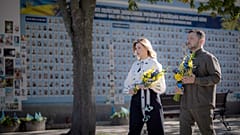 Ukrainian President Volodymyr Zelenskyy and his wife Olena lay flowers at the war memorial in Kyiv during celebration of the Ukraine independence day, 24 August 2024
