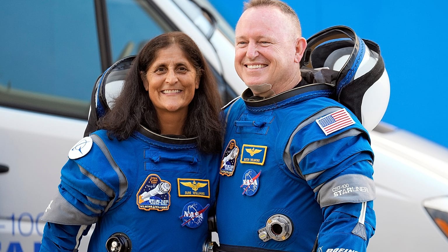 NASA astronauts Suni Williams, left, and Butch Wilmore stand together for a photo enroute to the launch pad.