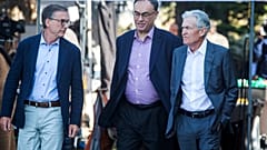 Governor of the Bank of Canada Tiff Macklem, left, and Governor of the Bank of England Andrew Bailey, center, walk with Federal Reserve Chairman Jerome Powell at Jackson Hole