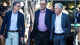 Governor of the Bank of Canada Tiff Macklem, left, and Governor of the Bank of England Andrew Bailey, center, walk with Federal Reserve Chairman Jerome Powell at Jackson Hole