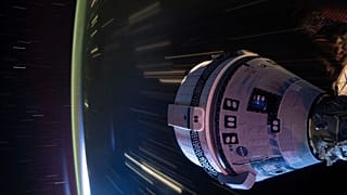 In this long-exposure photo provided by NASA, Boeing's Starliner spacecraft is docked to the Harmony module of the International Space Station on July 3, 2024