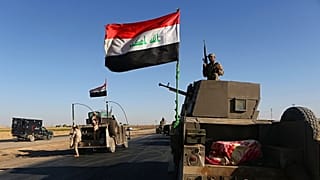 قوات الأمن العراقية خارج مدينة ألتون كوبري التي يسيطر عليها الأكراد، على مشارف أربيل، العراق، الخميس 19 أكتوبر 2017.