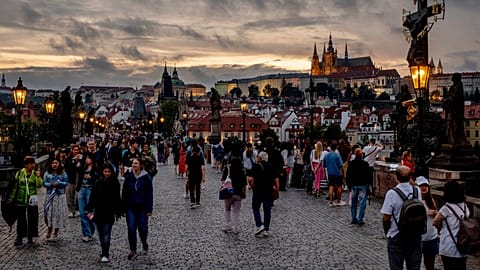 Tourists walk over the Karlsbruecke (Charles Bridge) in Prague, Czech Republic, 18 August 2024. 