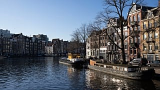 View of the historic center of Amsterdam, Netherlands, Friday, Dec. 16, 2022. (AP Photo/Peter Dejong)