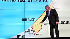  Benjamin Netanyahu com um mapa da Faixa de Gaza, diz aos espetadores que Israel deve manter o controlo sobre o “corredor de Filadélfia”, segunda-feira, 2 de setembro de 2024.