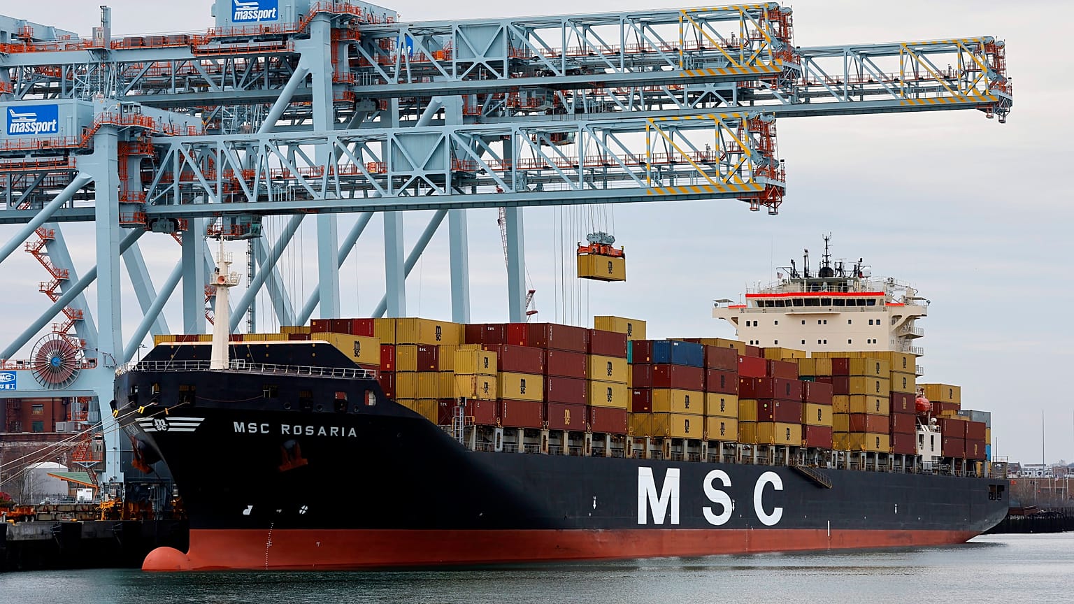 A Mediterranean Shipping Company container ship docked at the Conley Terminal, Friday, March 17, 2023, in Boston. (AP Photo/Michael Dwyer)