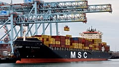 A Mediterranean Shipping Company container ship docked at the Conley Terminal, Friday, March 17, 2023, in Boston. (AP Photo/Michael Dwyer)