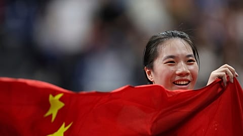 China's Huang Wenjuan celebrates after winning the Women's Singles WS8 Gold Medal Match against Norway's Aida Husic Dahlen during the 2024 Paralympics, Saturday, Sept. 7, 2024