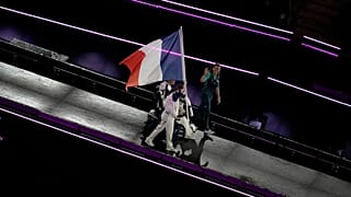 Members of the French delegation parade during the closing ceremony of the 2024 Paralympics in Paris, 8 September 2024