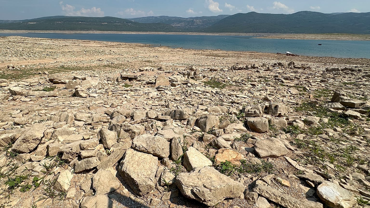 The dried up Bileca lake, near the town of Bileca, Bosnia, Thursday, Sept. 5, 2024. 