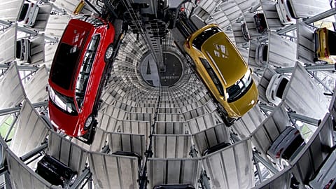 New cars readied for handover inside one of two 'car towers' at the Volkswagen car factory in Wolfsburg