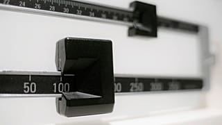 A closeup of a beam scale is shown.