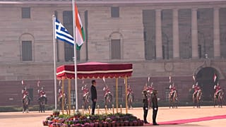 Greece's Prime Minister Kyriakos Mitsotakis inspects a joint military guard of honor during a ceremonial reception in New Delhi, India, Wednesday, Feb. 21, 2024. 