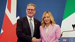 Giorgia Meloni and Keir Starmer shake hands after a joint news conference at Villa Doria Pamphilj in Rome.